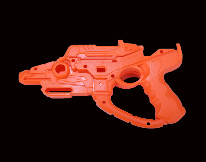 Пластиковые детали игрушечного водяного пистолета